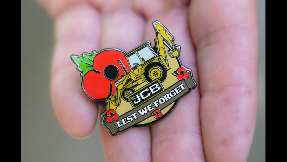 Ex-firefighter designs JCB pin-badge for Poppy Appeal image